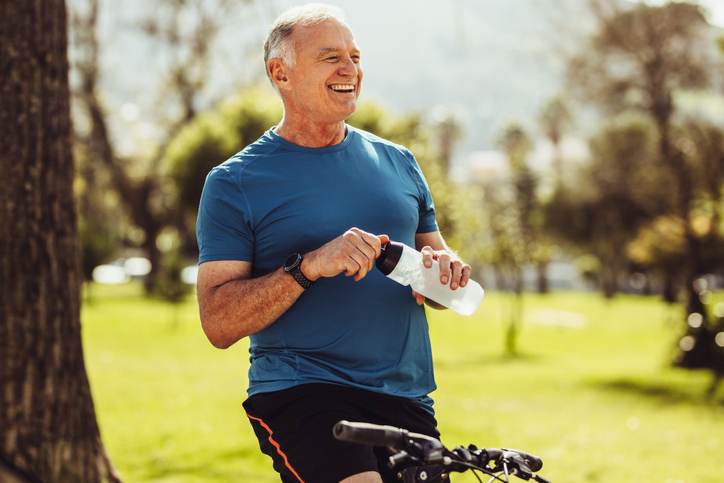 Senior fitness man drinking water Senior fitness man drinking water