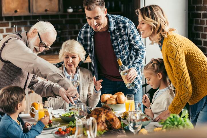 family having holiday dinner family having holiday dinner
